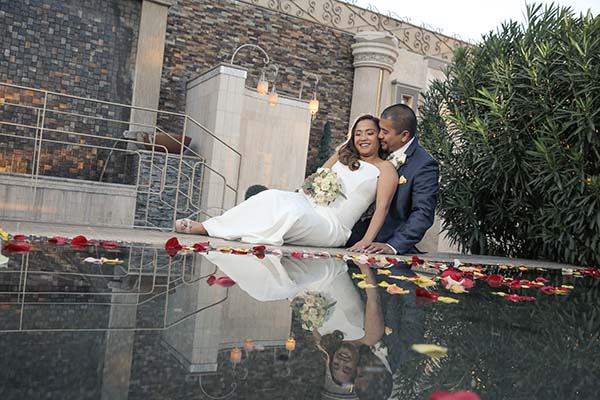 Wedding Photographer, Andreo and wife at Reflection Falls at Las Vegas Wedding Chapel of the Flowers