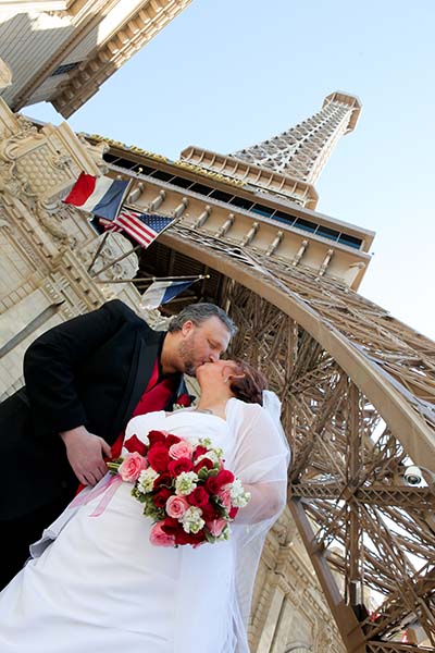 Las Vegas Strip Wedding Photo Session in front of Paris Las Vegas by Chapel of the Flowers